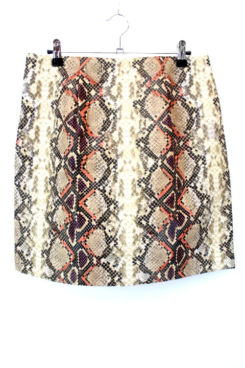 Jupe triangle en similicuir avec fermeture éclaire sur la gauche CAMAÏEU taille 40 - Vêtement de seconde main - Friperie en ligne