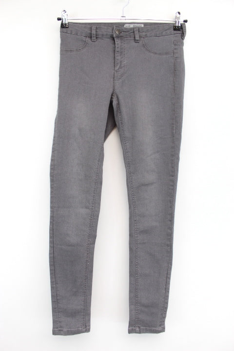 Pantalon serré à fausses poches devant La Halle taille 38 - friperie femmes, vêtements d'occasion, seconde main